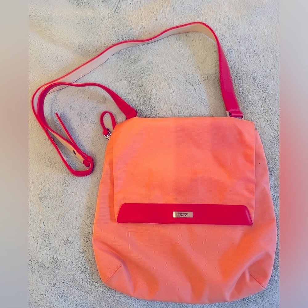 Tumi Crossbody Bag — pale orange with dark orange straps